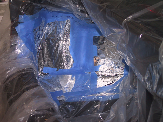 Foil and plastic dropsheet for extra protection.